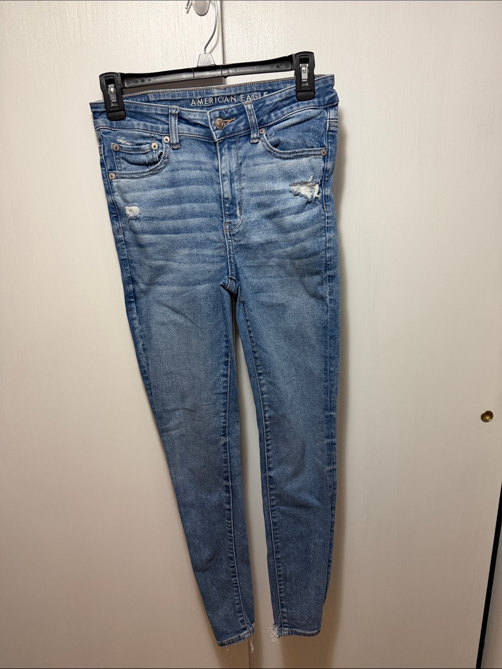 American Eagle Outfitters Medium Blue Skinny Jeans with Light Distress